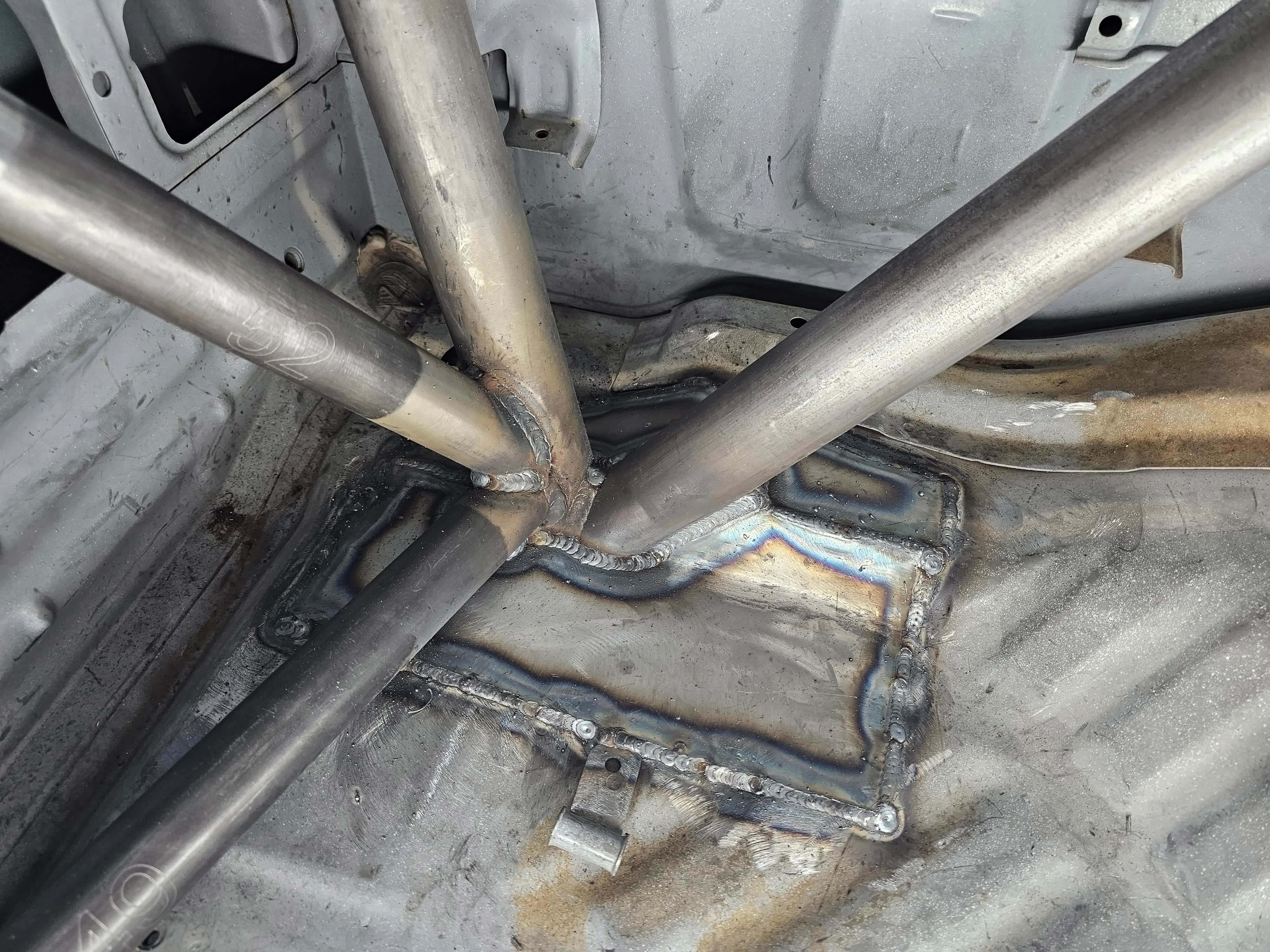 First Gen Toyota Tacoma Roll Cage WIY Kit, Internal Cab Photo, C-Pillar / Floor Plate Driver Side Close Up